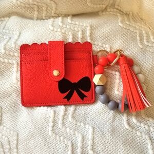 Bow wrislet wallet